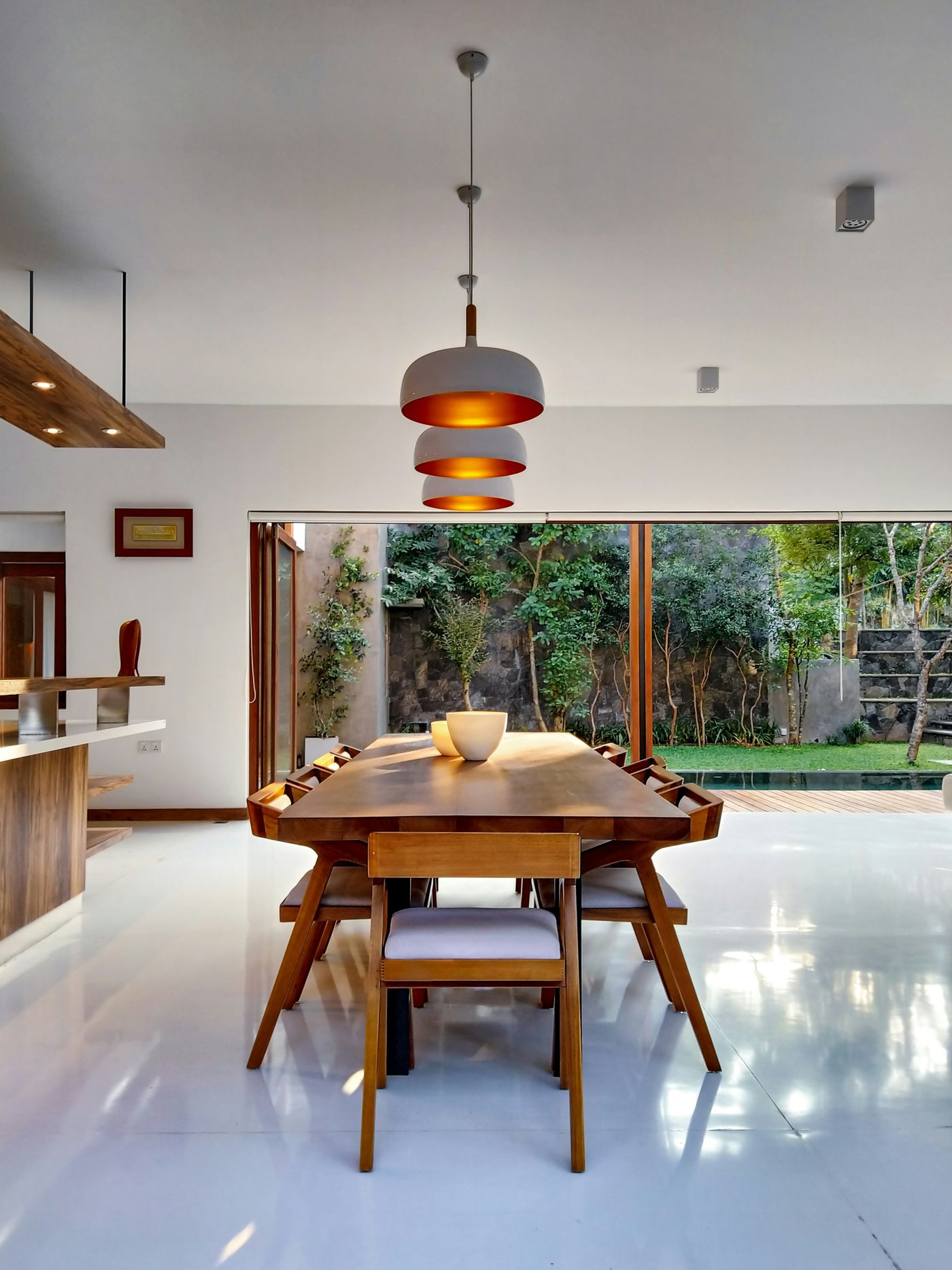 Warm wood dining space styled with intention